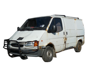Image of a rusty white van